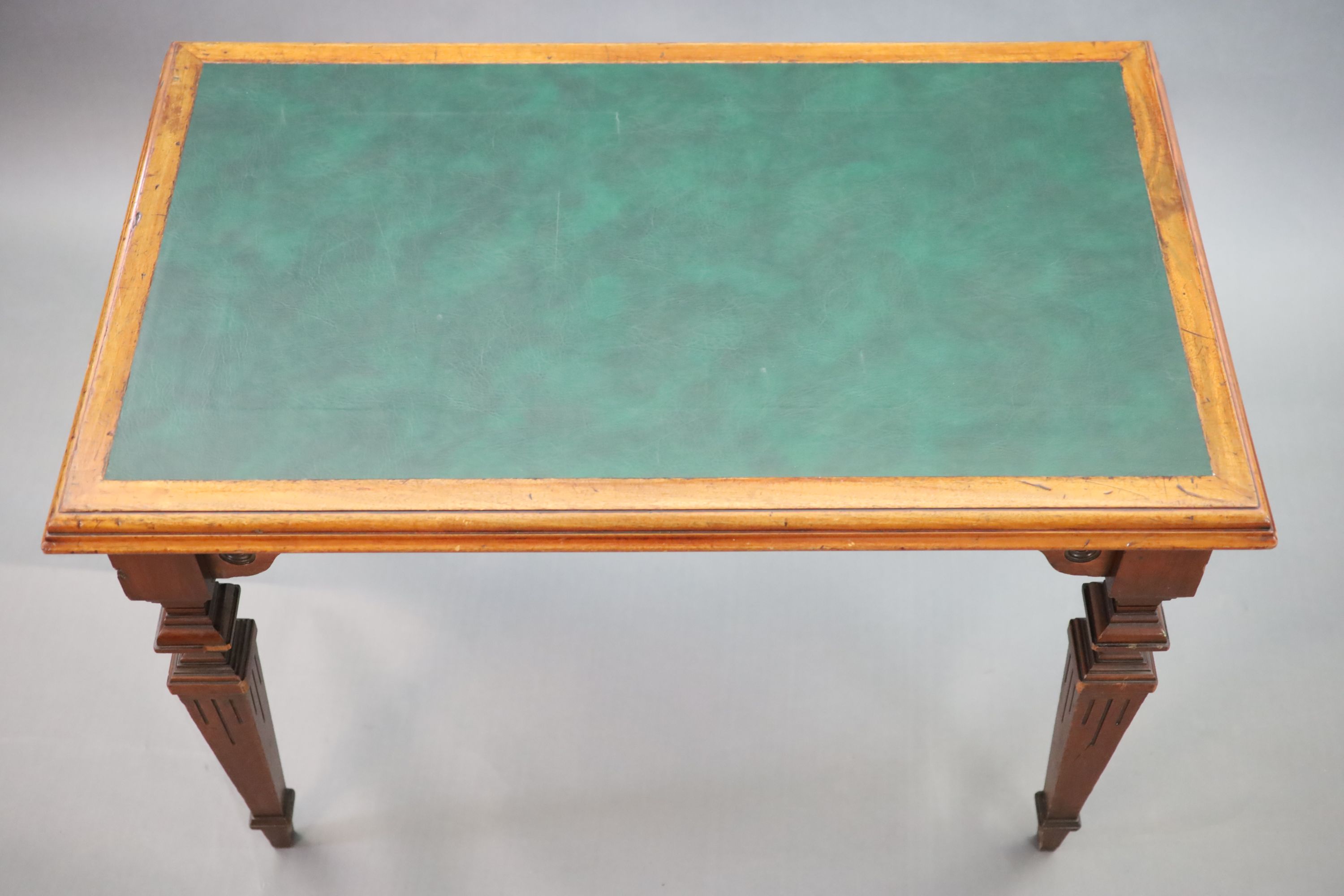 A Victorian mahogany library table, supplied by Sage & Co. Shopfitters of London, W.113cm D.69cm H.78cm